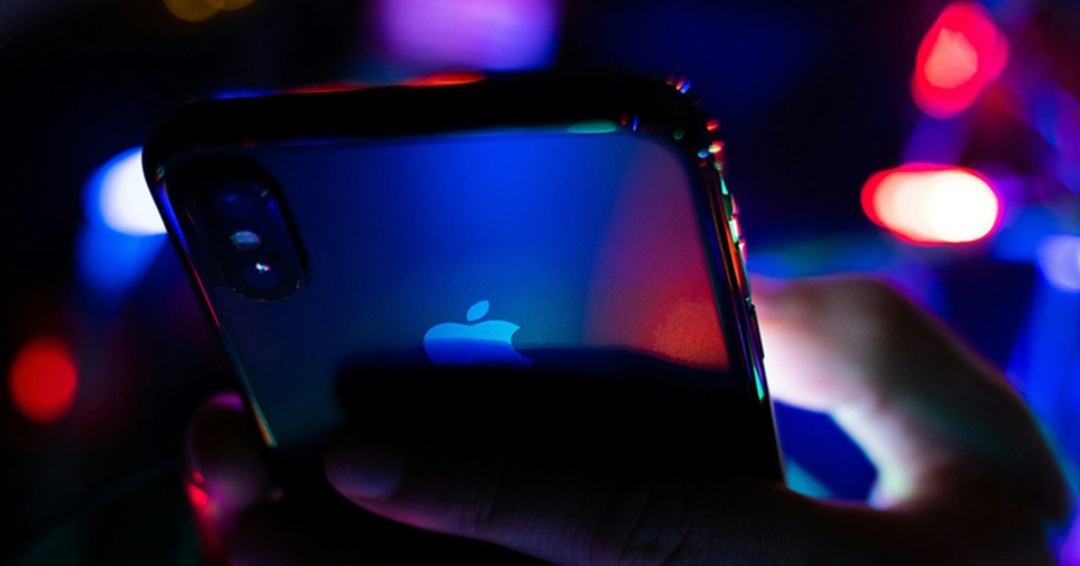 iPhone with Christmas Lights Photo Source // Unsplash: Zachary Olson